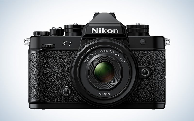 The Nikon Z f retro-styled mirrorless camera in an all black color way.